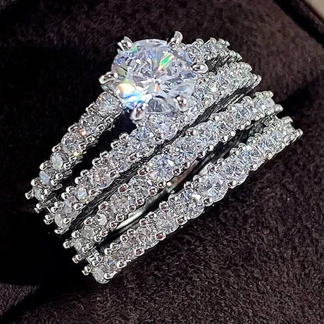 bs3_85_848266595436.jpg Olivetta Bypass Round Cut Bridal Ring Set - 图片 1