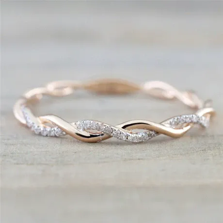 er5_145_640104276528.jpg Minimalist Twist Round Cut Engagement Ring - 图片 1